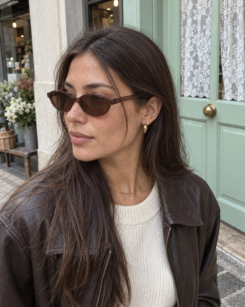Sunglasses, worn