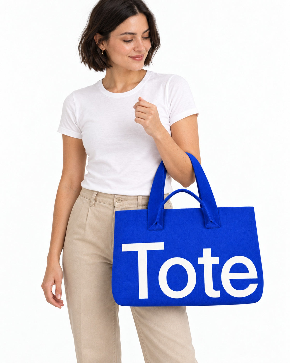 The Tribeca Tote in Cobalt Blue on a model, studio shot