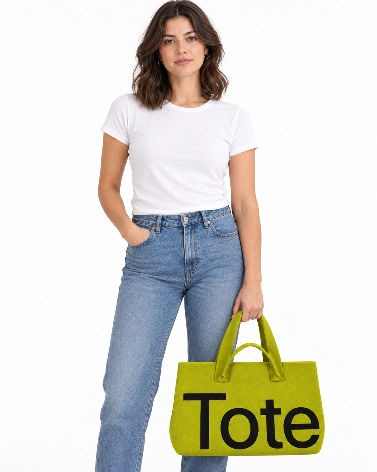 The Tribeca Tote in Lemongrass on a model, studio shot